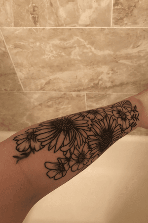 Tattoo done by Mark Toth in Spring Hill, Fl. @marktothtattoos (His Instagram) #flowers #arm #wraparound #blackandgreytattoo 