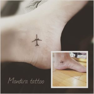 Airplane minimal tattoo. Ankle, foot