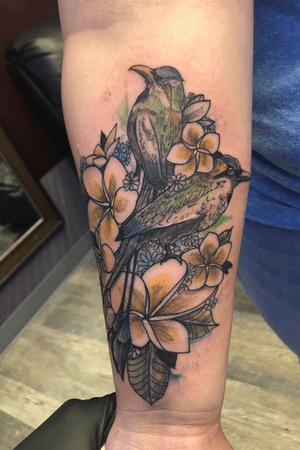 Bird and flower watercolor tattoo