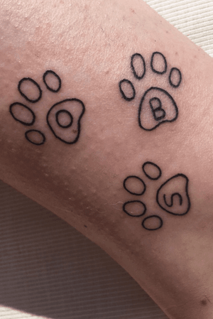 Paw prints with my dogs’ initials in each one