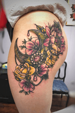 Ornamental thigh gemstone watercolor flower tattoo