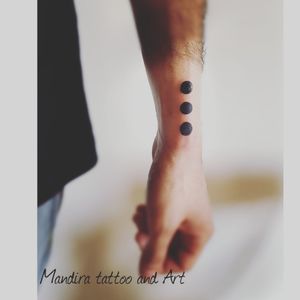 Dots hand tattoo