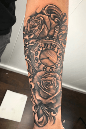 Black and grey roses and pocket watch