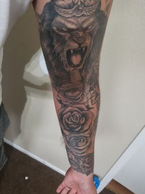 Rose's tattoo half sleve with lion God of Egypt 