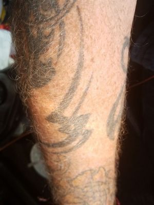 Can some one help think of a good coverup for this tattoo. I would like to have cover up