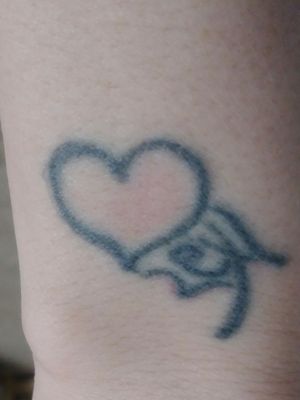 I was 13 and drunk at a party my first and only tattoo