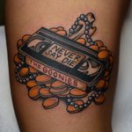 Never Say Die - rad Goonies tattoo by Tony Talbert #TonyTalbert #80stattoos #color #traditional #newschool #mashup #vhstape #coins #gold #pearls #bones #TheGoonies #movietattoo #Goonies #Neversaydie