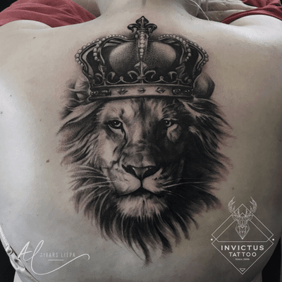 king lion tattoo on arm
