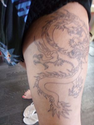 Outline of a dragon on my thigh , getting it finished next week 