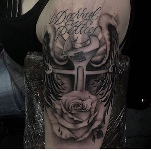Tattoo by Sacred Hand Tattoo Society