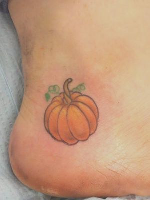 small pumpkin tattoo inspo