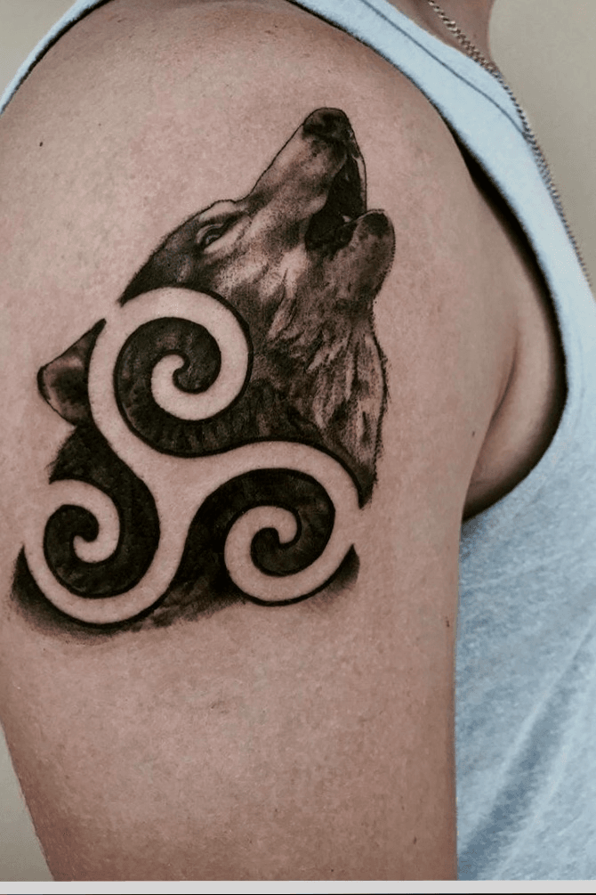 Tattoo uploaded by Marcos • Wolf with triskelion Alpha,Beta,Omega • Tattoodo