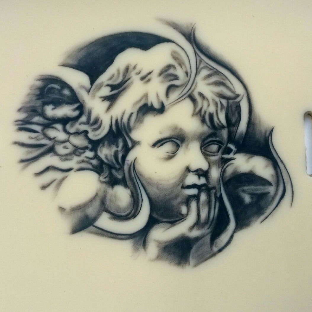angel face tattoo
