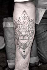 Linework lion on Pats forearm