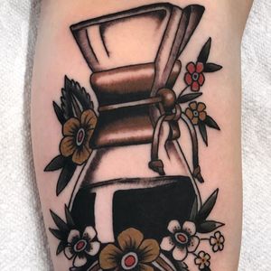 Chemex is my only love. Tattoo by Jarret Crosson #jarretcrosson #coffeetattoos #color #traditional #chemex #caffeine #glass #cofee #flowers #leaves #floral