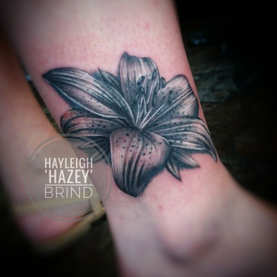 Black and Grey Lily Flower Tattoo  Heart for Art  Tattoo Shop   Manchester  Blog  Heart for Art  Tattoo Artists  Cover up Tattoo  Artists  Portrait Tattoo Artist  Stalybridge  Manchester  UK