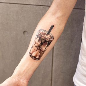 Iced Coffee tattoo by Chenjie #Chenjie #chenjienewtattoo #coffeetattoos #color #realism #realistic #painterly #watercolor #icedcoffee #caffeine #glass