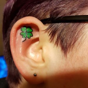 Four-leafed clover in ear.