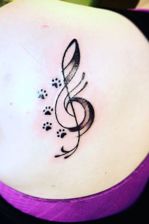 Bass clef & paw prints