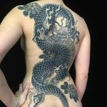 Tattoo by Sergey Buslay #SergeyBuslay #tattoodoambassador #Japanese #irezumi #blackandgrey #dragon #flowers #mums #floral #fire #folklore #mythicalcreature