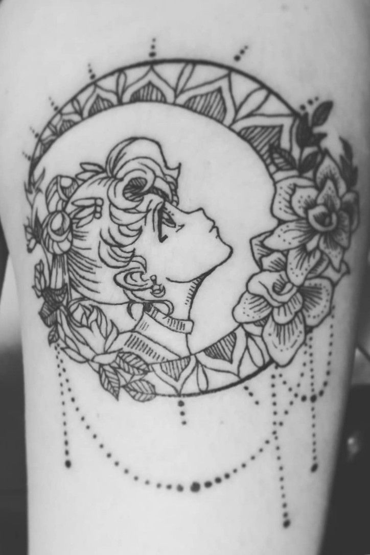 Sailor moon inspired tattoo on the back of the right
