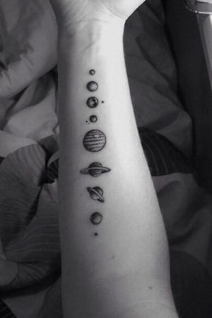 Space solar system Left arm, insideThe og, first tattoo I wanted