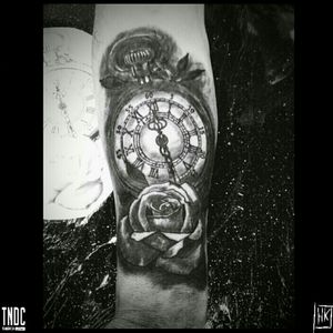 Old clock and rose.Black and grey tattoo.By me.