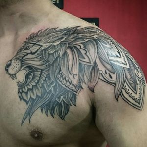 Lion mandala tattoo