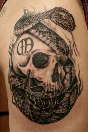Love this tattoo of Pantera's Cowboys From Hell skull with a snake going through it. Really a piece of art. Don't know who did this, or who's it is. But I did find it online. Not my work!