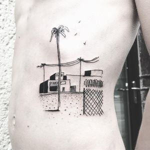 Desolate landscapes. Tattoo by Nils Goldgrund #NilsGoldgrund ##blackandgreytattoos #blackwork #linework #illustrative #ignorantstyle #landscape #palmtree #buildings #barbedwire