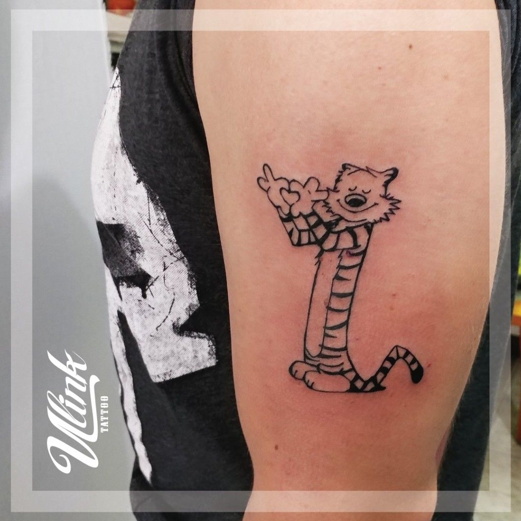 Sweet dad celebrates his two sons with a Calvin and Hobbesstyle tattoo