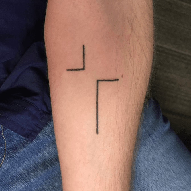 forearm cross tattoos