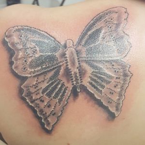 Black lace butterfly. This is a memorial tattoo for my piano teacher that passed away with lung cancer. She gave me 5 white lace butterflies before she died. I wanted one on my skin to remind me of her and the calmness she gave me.