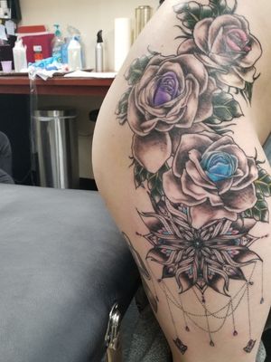 Side rose and Mandela tattoo by Brandi 