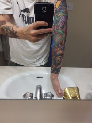 Hard to take pics alone lol. But sleeve is almost done on right arm sorry I haven't been updating regularly. All work done at limestone city tattoo in Kingston Ont Canada by Ayles Love.