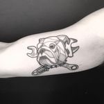 Tattoo by Jack Poohvis #JackPoohvis #dogtattoos #linework #dotwork #dashwork #illustrative #dog #bulldog #mechanic #wrench #tools