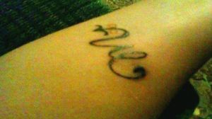 This is the only tattoo I have on my arm it doesn't look like much, but it is very close to my heart.