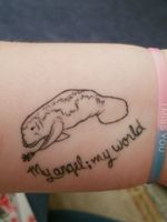 This is my tattoo, I am a 14 year old and I got it in memory of my grandfather and my ill mother. The words "My Angel; My World" from BTS Jimins Solo Song Serendipity resemble my Grandfather and my angel, my mother as my world