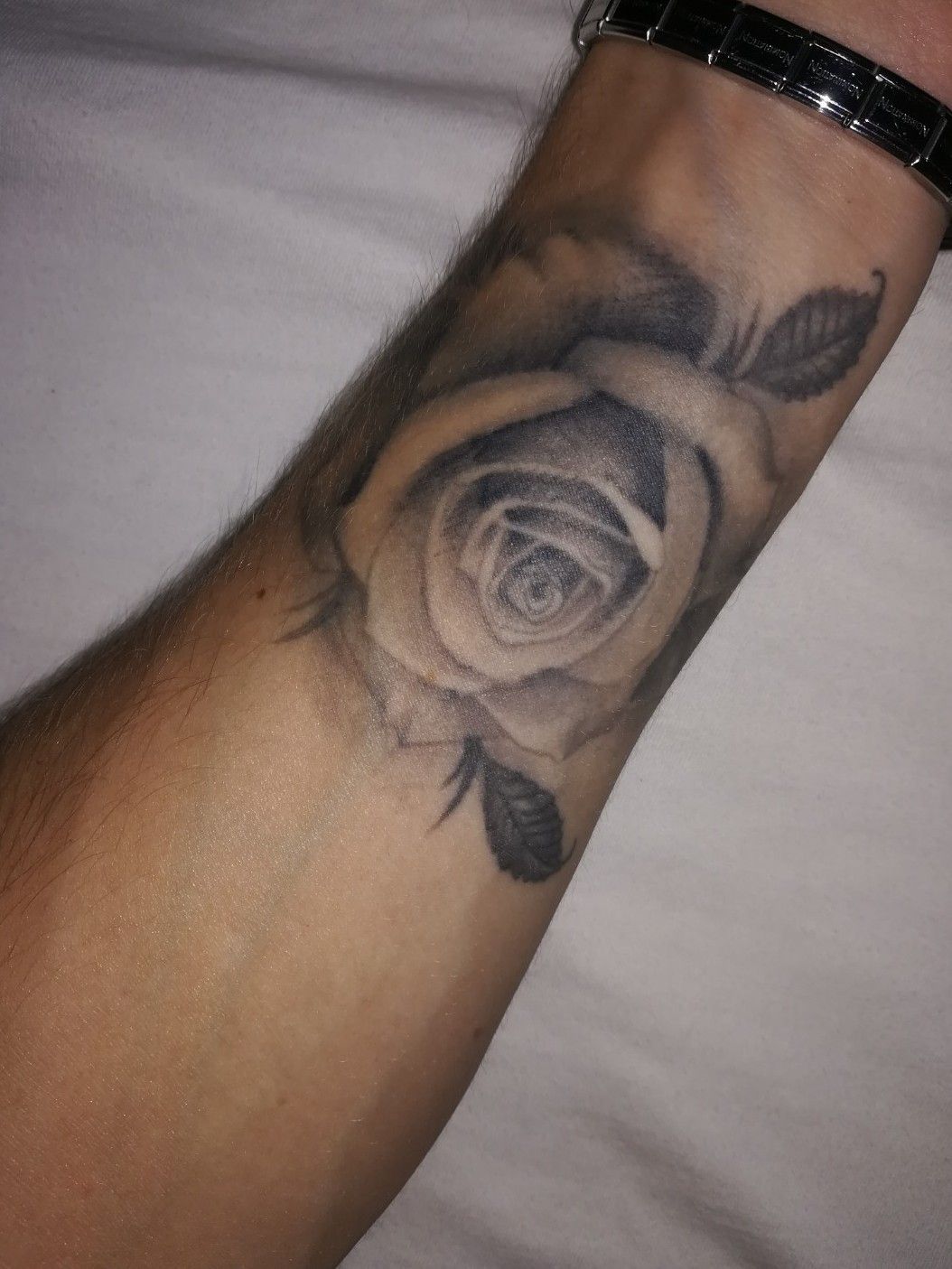 Black  Grey Shaded Rose Tattoo On Outer Forearm
