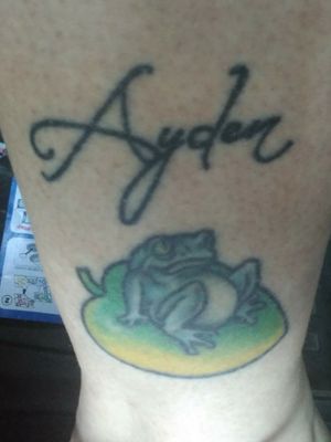 Had the frog first in 2005  at Artist At Large  Wichita KS. Four years later I added the Lilly pad and my son's name also in Wichita at Addictions In Ink