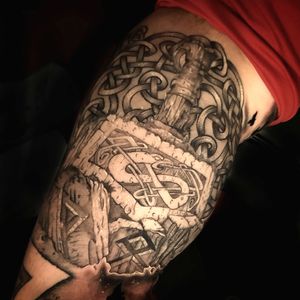 Inner bicep Viking hammer piece and Celtic knots, #vikingtattoo #viking #hammer #blackandgreytattoo #blackworktattoo 