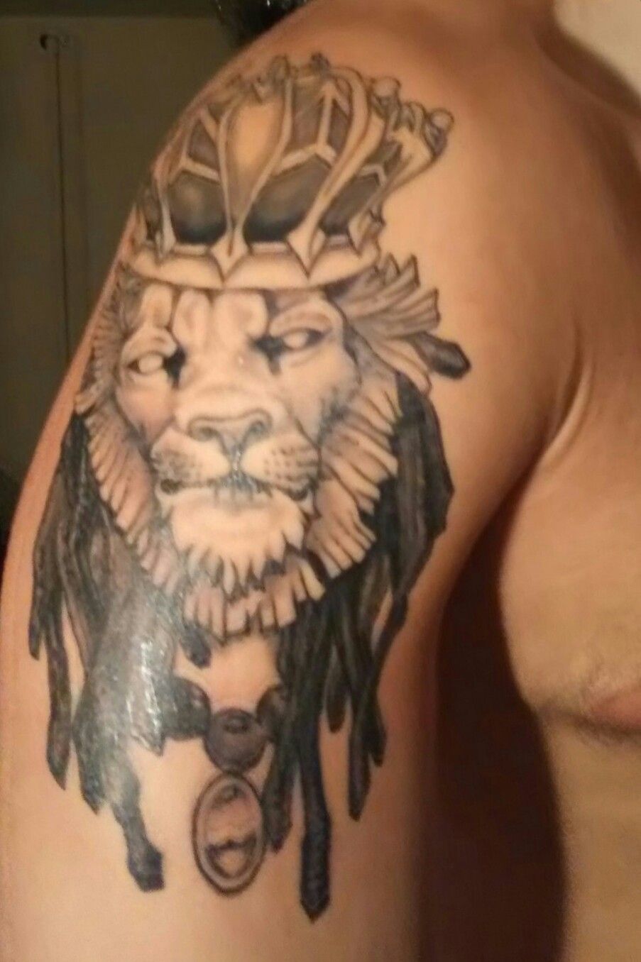 Dread Lion Tattoo On Right Shoulder