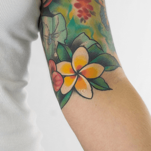 Healed frangipani flower on the elbow pit, spider done by another artist