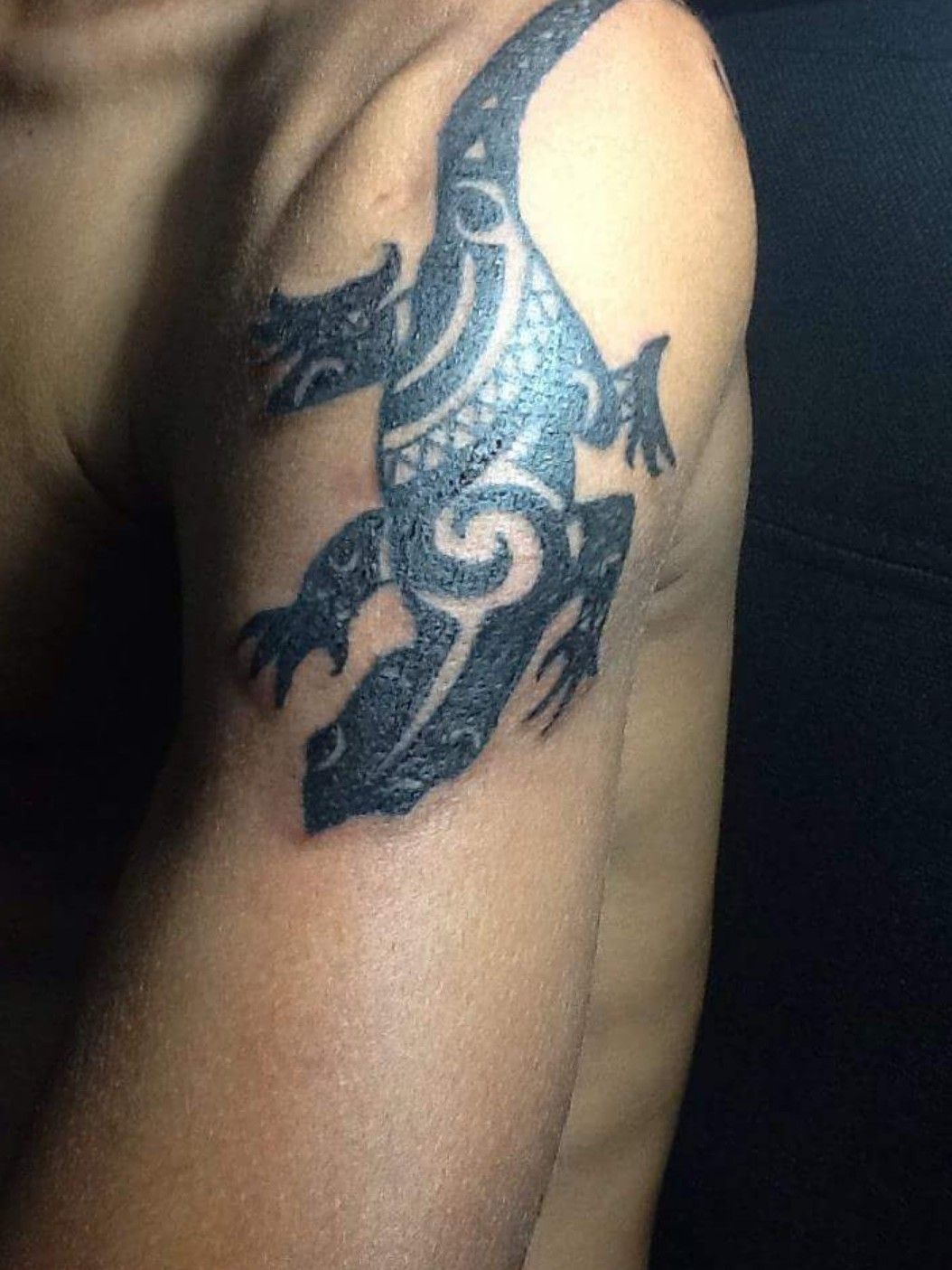 tribal iguana tattoo