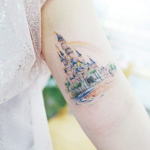 Tattoo by Banul #Banul #landscapetattoos #color #watercolor #fineline #linework #painting #Disney #castle #rainbow #fairytale