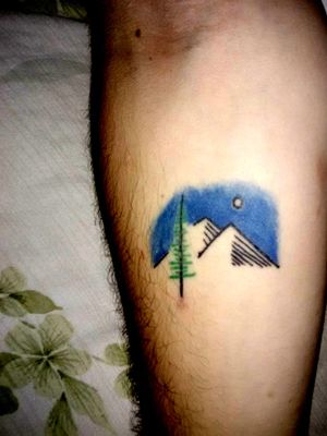 This is my first real tattoo. Yes I know it's not all that amazing but it has so much meaning to me. First, the tattoo represents where I was born, Utah, filled with nature and mountains. Second, the tree in this tattoo is an evergreen. The house I grew up in had an evergreen right out front that was probably over 50 feet tall. I love this tattoo. 