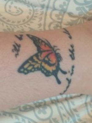 Butterfly, sister tattoo. "Ill be the wings to keep your head in the clouds"