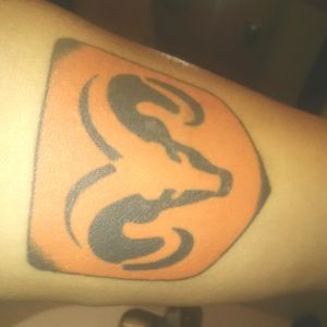 Ram logo forearm tatoo.