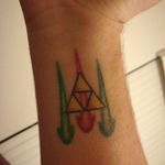 Triforce with the 3 stones from Ocarina of Time on the wrist/forearm #gamingtattoo #Gaming #gamingtattoos #legendofzelda #Triforce 