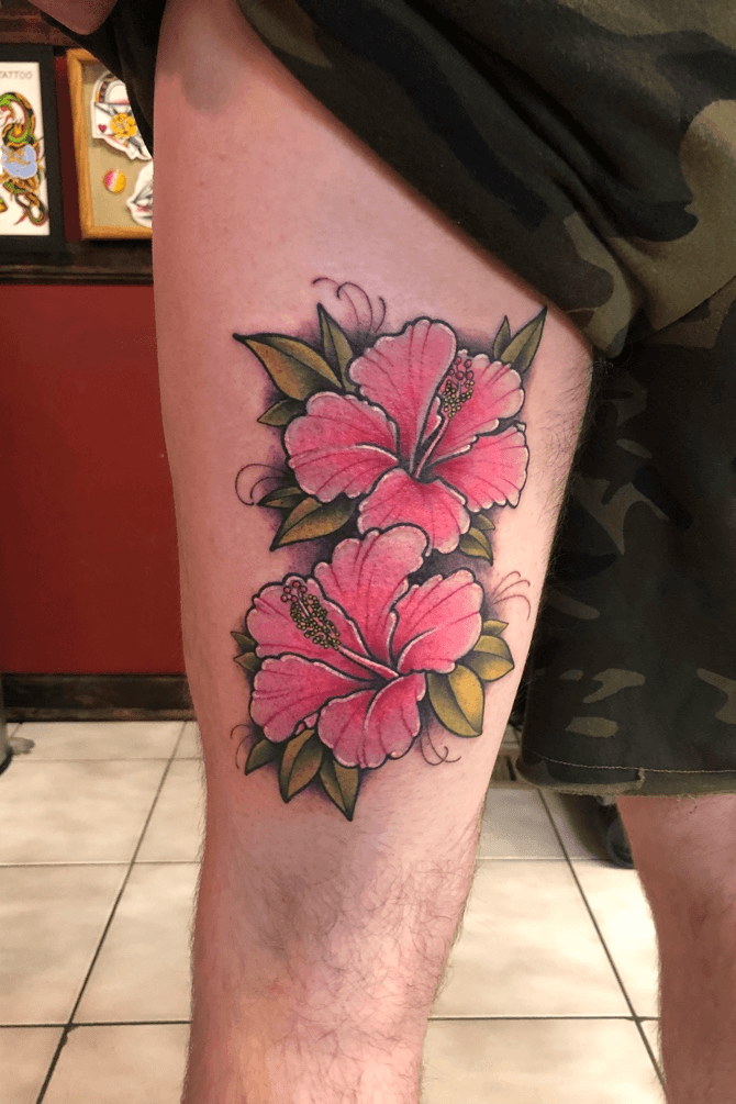 Wicked Ink Tattoo and Body Piercing  Does seeing this stunning piece by  brusselltattoo make anyone else want to book a trip to Hawaii  hibiscustattoo hibiscus frangipani frangipanitattoo tropicalflowers  hawaiianflowers legtattoo girlytattoos 